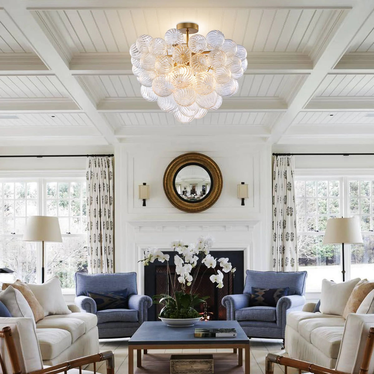 Ribbed glass globe semi-flush chandelier on a coffered ceiling above a living room