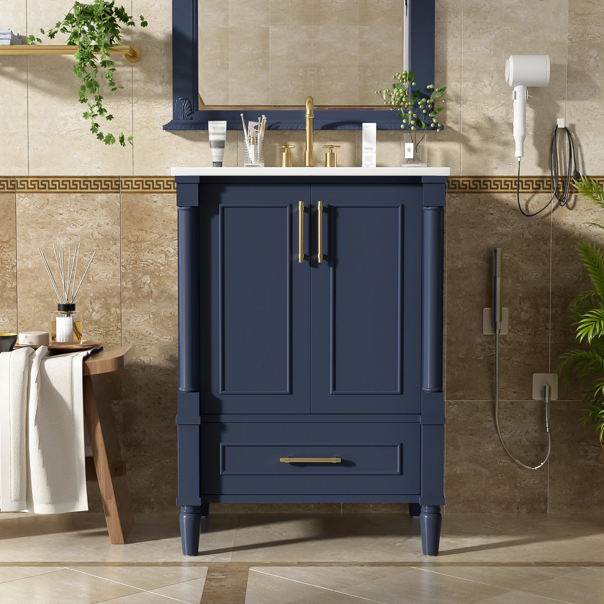 Navy carved-leg vanity styled in a bathroom