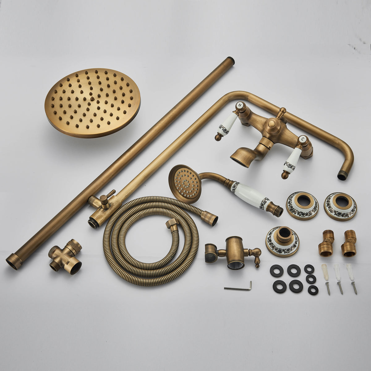 Antique brass shower column components laid flat with rain head, hose, handshower and fittings
