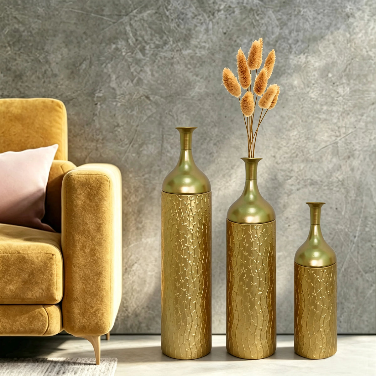 Gold leaf-pattern floor vases with dried stems