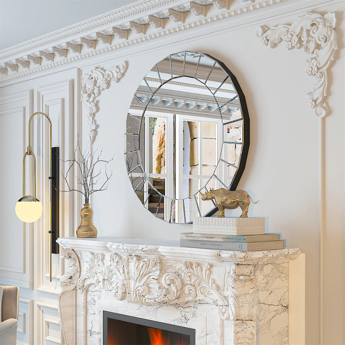 Venetian-style round mirror with segmented mirrored border hung above a carved marble fireplace