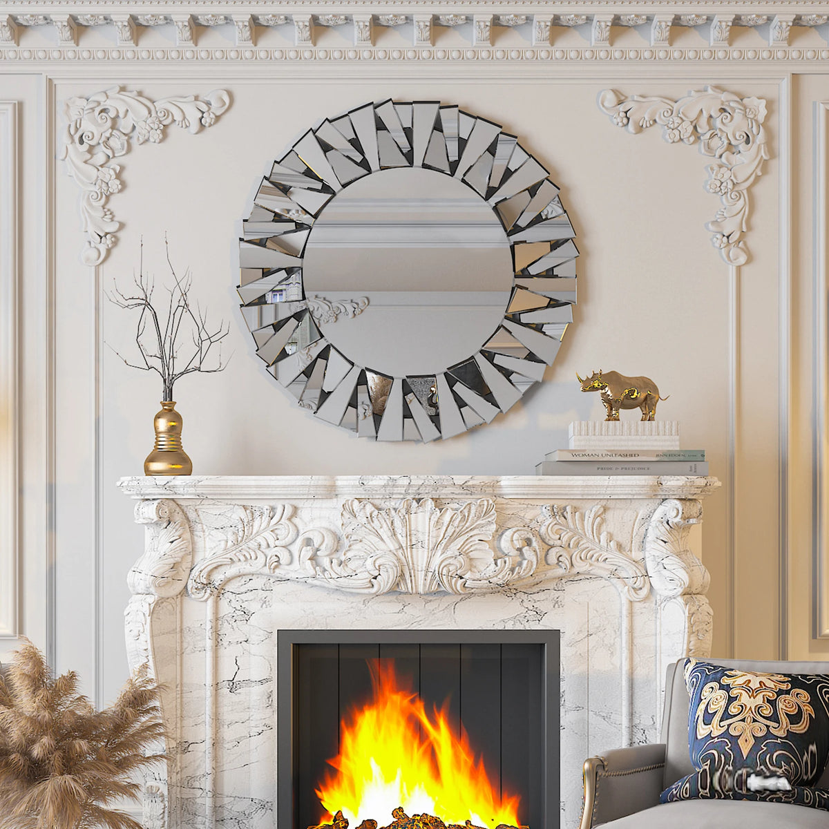 Round silver sunburst mirror with beveled mirror shards above a carved white marble fireplace