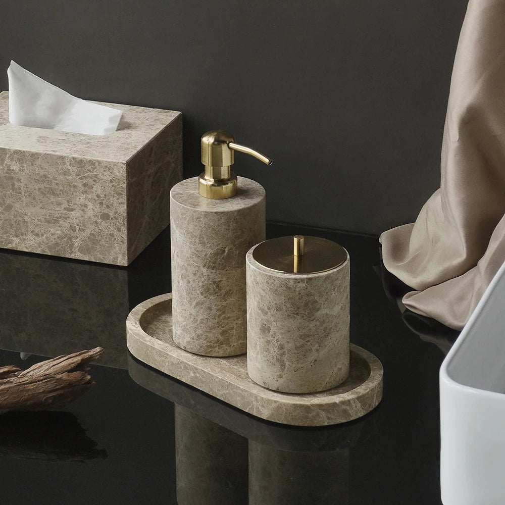 Emperador marble tissue box, gold-tone pump dispenser and lidded jar on an oval tray