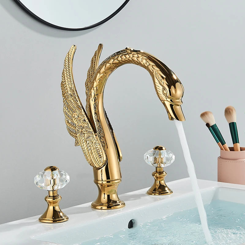 Gold Swan Widespread Faucet with Crystal Handles, on a vanity