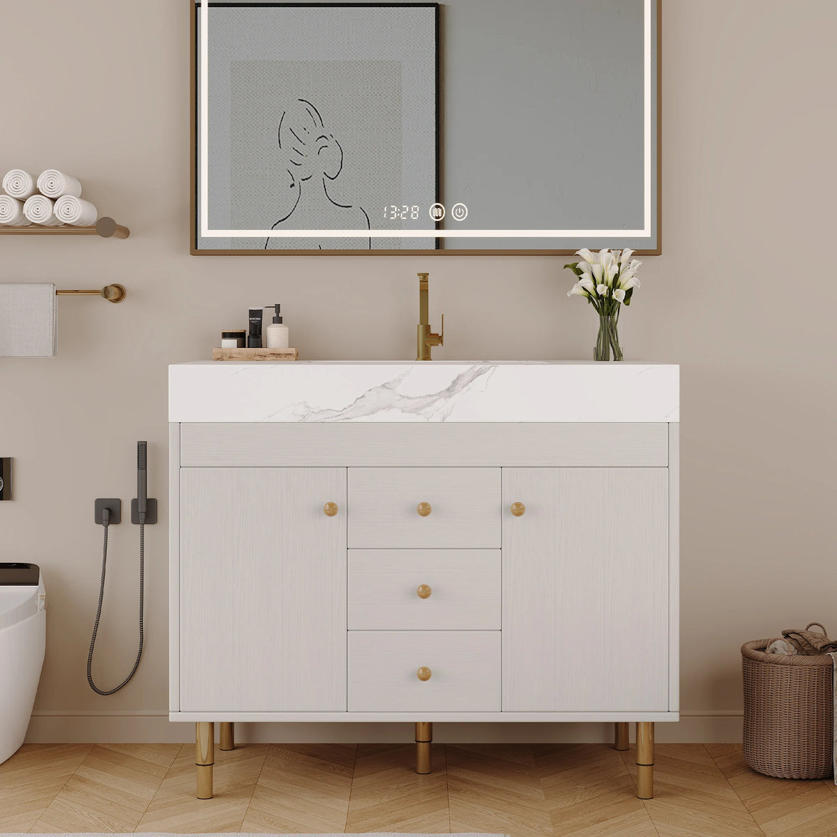 White 36 in bathroom vanity with gold legs and a marble-look top