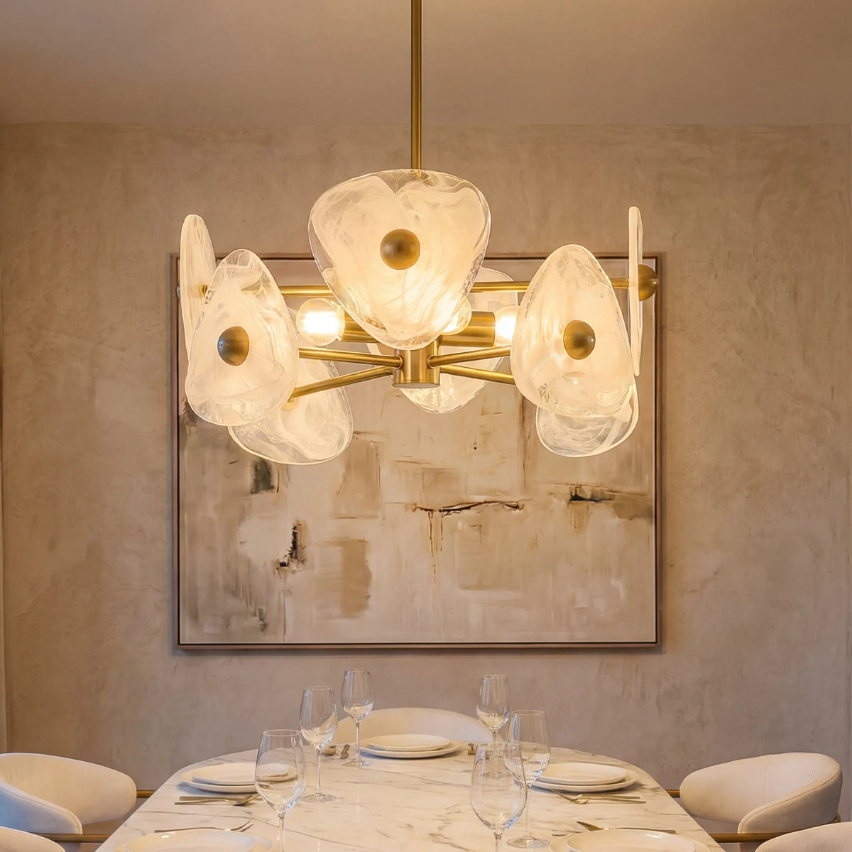Gold four-light chandelier with petal shades above a dining table
