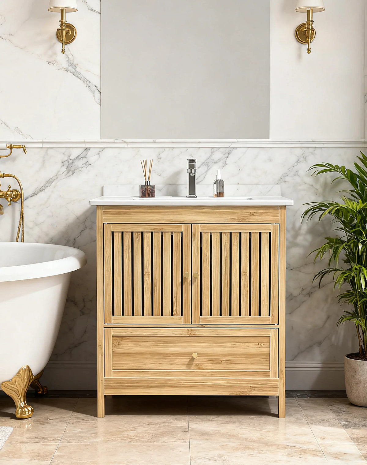 Natural bamboo bathroom vanity with gold handles in a marble bathroom