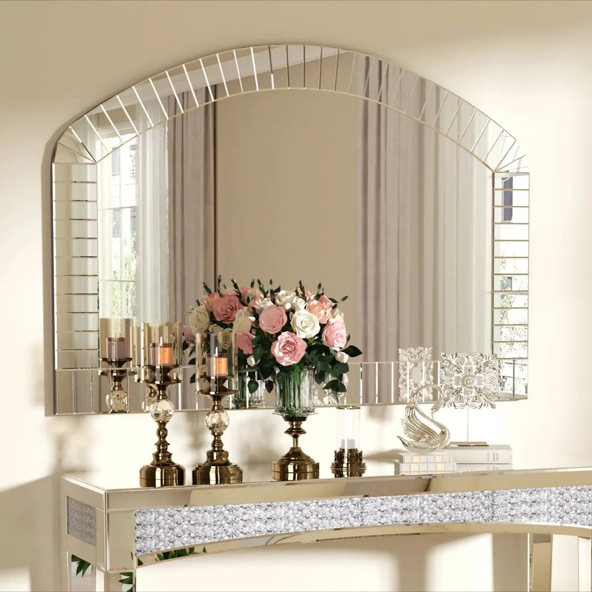 Extra-large arched Venetian glass mirror with beveled border above a mirrored console and roses