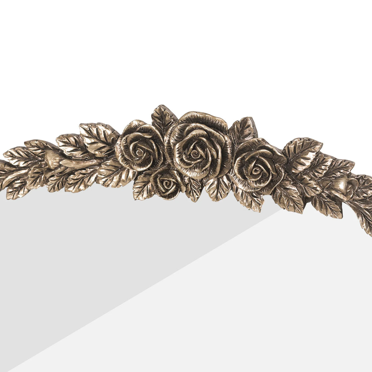 Close-up of the ornate baroque crest in antique brass