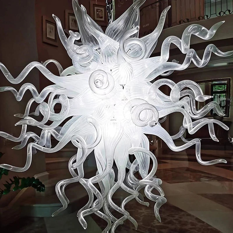 Close-up of the hand-blown white glass chandelier showing curled and spiked glass arms