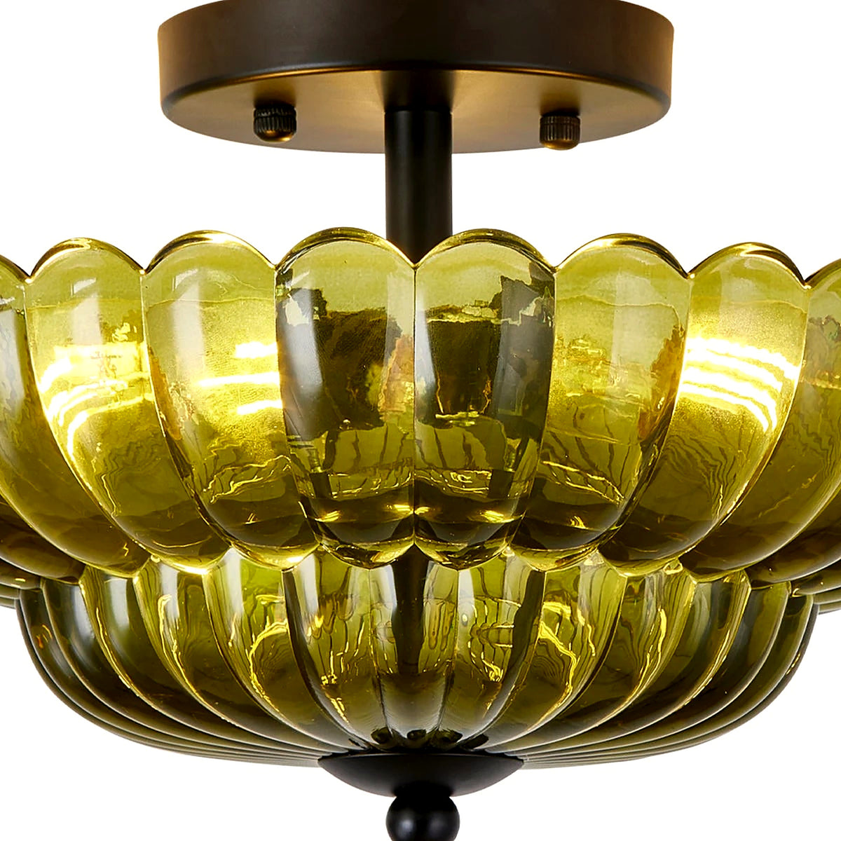 Close-up of the ribbed olive-green glass petal tiers