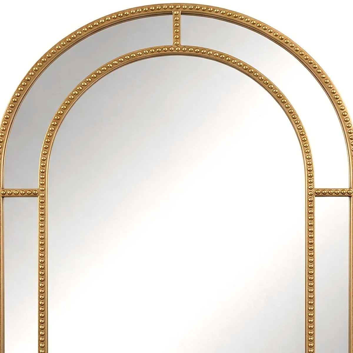 Close-up of the beaded gold arch crown on the wall mirror