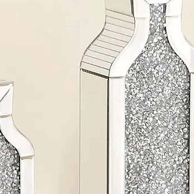 Detail of the sculpted mirrored neck and sparkling crushed-crystal body