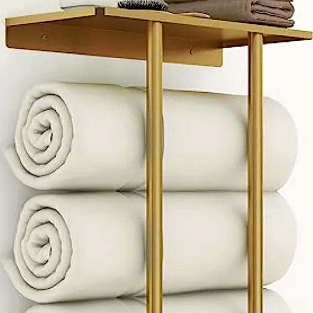 Detail of the top shelf and vertical bars in brushed gold