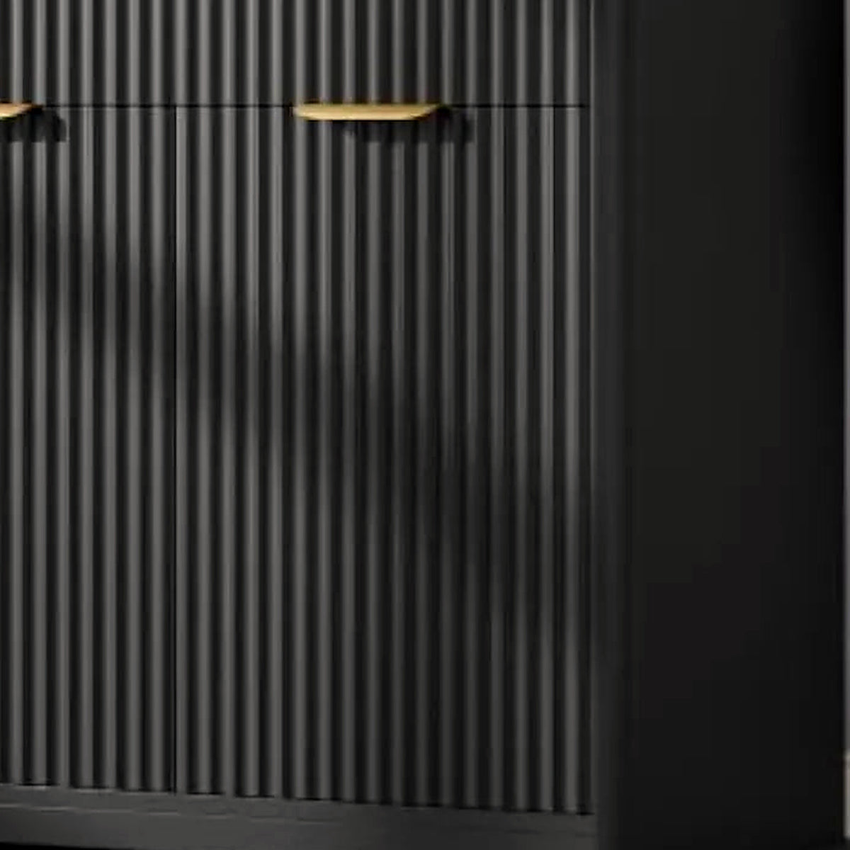 Close-up of the reeded black fluting texture wrapping the vanity front