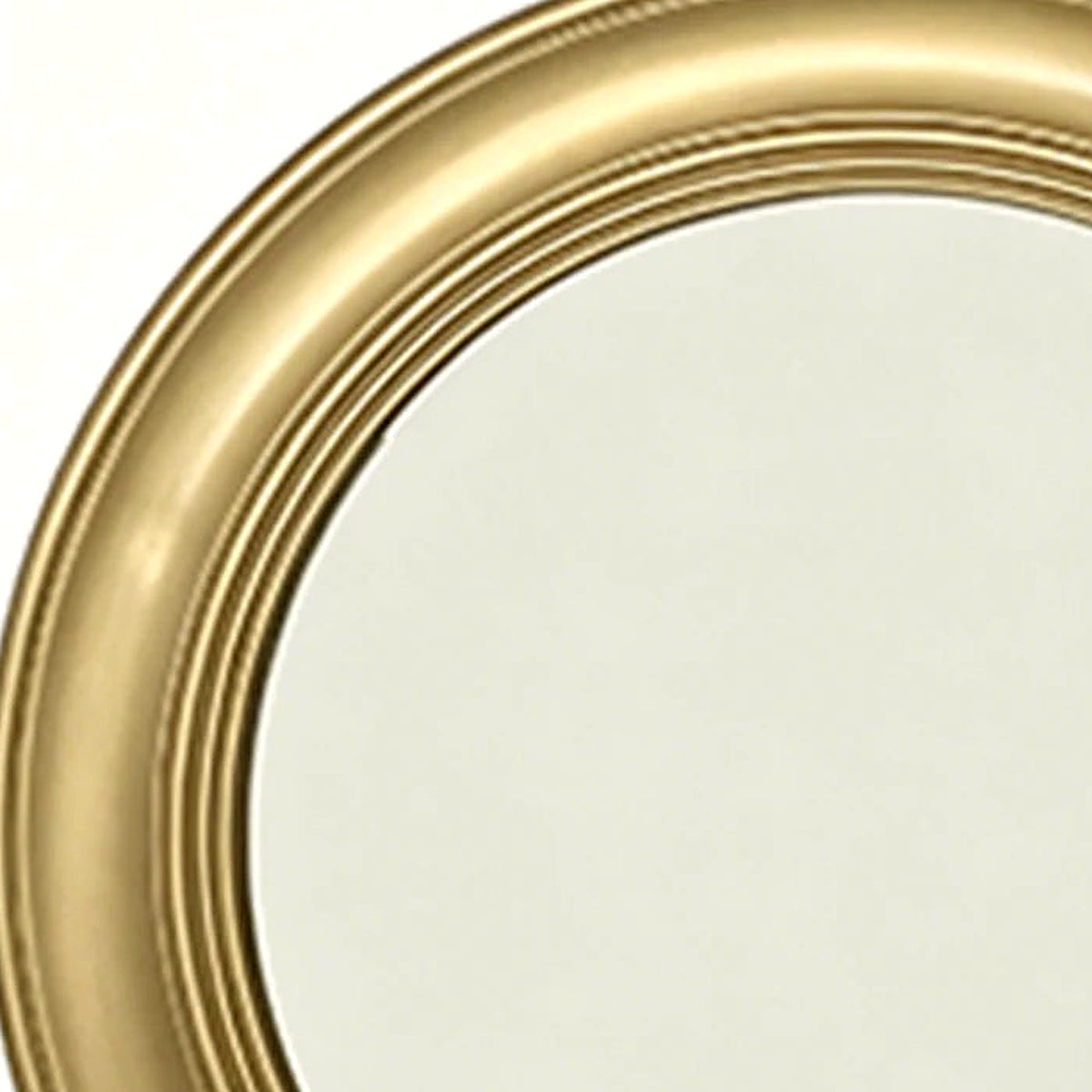 Close-up of the concentric gold ridges circling the mirror glass