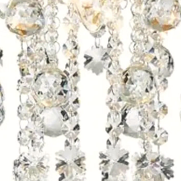 Close-up of faceted crystal spheres at the tips of the strands