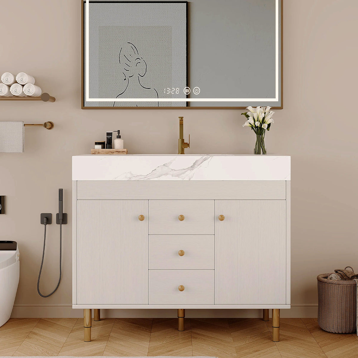 White bathroom vanity with gold legs and marble-look top, 36 in (mirror and décor shown for styling)