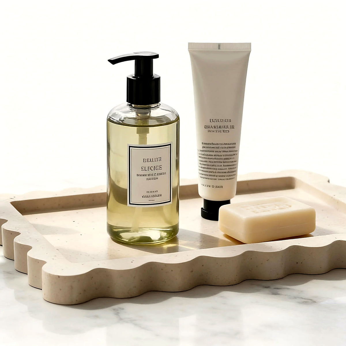 Scalloped natural travertine vanity tray in warm beige stone (soap and lotion shown for styling)