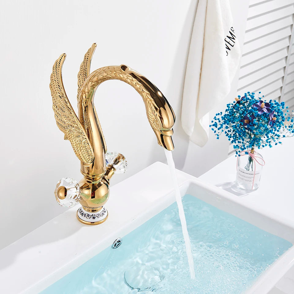 Gold Swan Single-Hole Basin Faucet, running water into a white basin