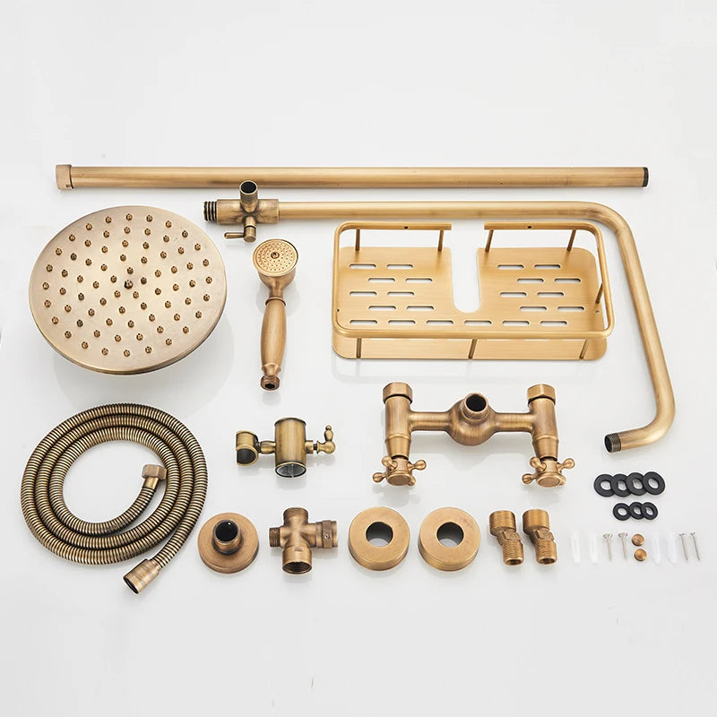 Antique brass exposed shower set components laid out with hose, shelf, valves and fittings