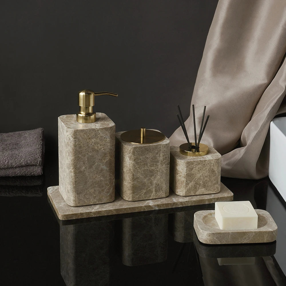 Emperador marble soap dispenser, canister and reed diffuser on a marble tray