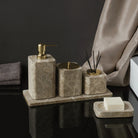 Emperador marble soap dispenser, canister and reed diffuser on a marble tray