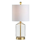 Clear glass and brass table lamp with white linen drum shade and brass finial