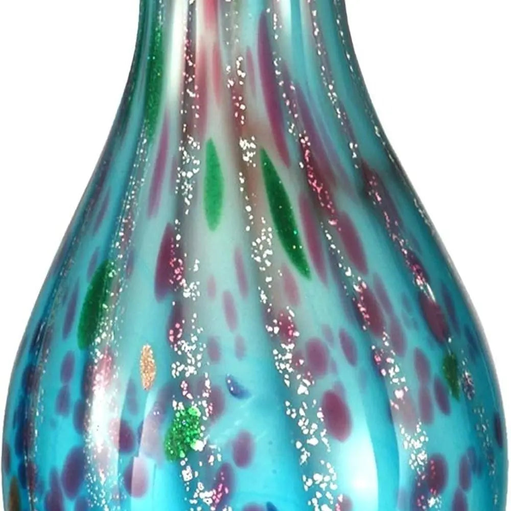 Hand-blown teal art glass vase with violet and silver inclusions, close-up