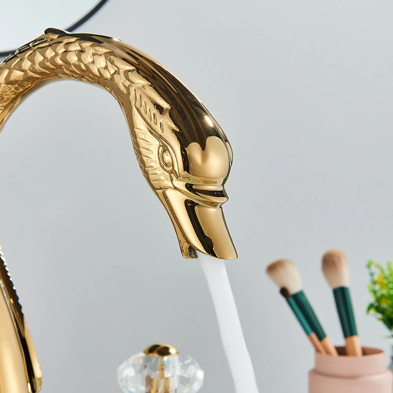 Gold Swan Widespread Faucet with Crystal Handles, swan spout close-up