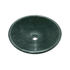 Top-down view inside the polished green marble vessel sink basin and drain opening