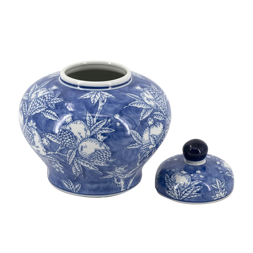 Blue and white porcelain jar shown with its lid removed