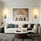 Knurled gold glass-tube wall sconces flanking artwork in a living room