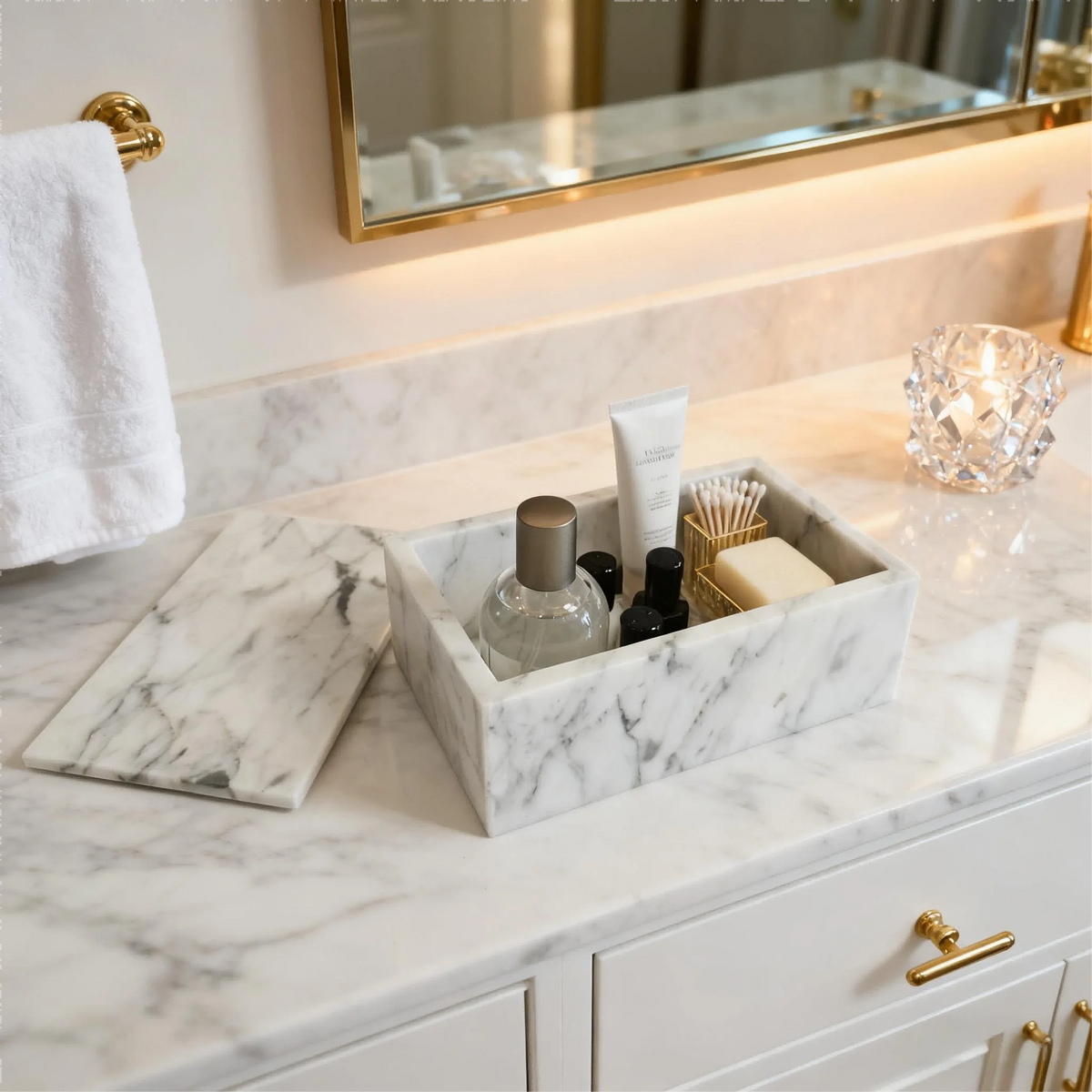 Carrara marble vanity box holding toiletries on a bathroom counter