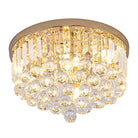 Small gold flush mount ceiling light with tiers of crystal drops