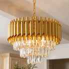 Close-up of the gold fluted crown chandelier with three tiers of clear K9 crystals