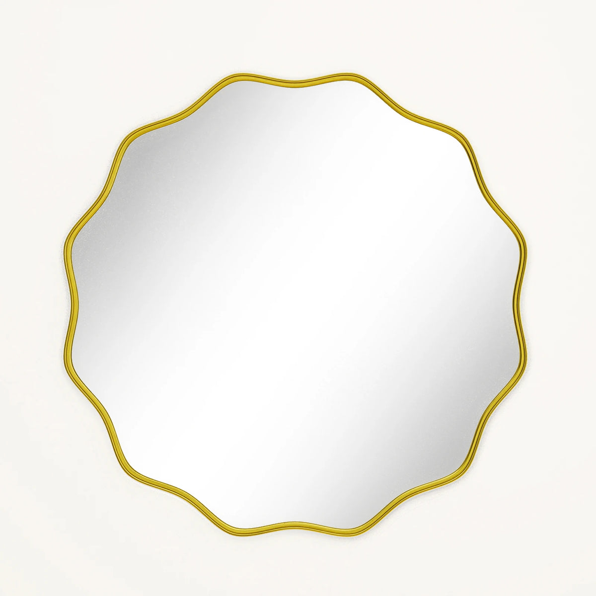 Front view of the wavy scalloped round mirror's thin gold frame on white