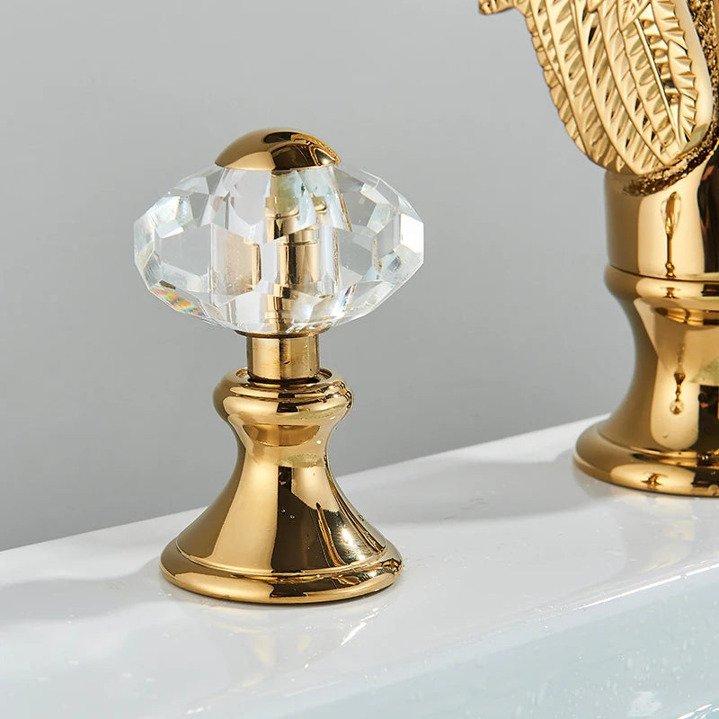 Gold Swan Widespread Faucet with Crystal Handles, crystal handle detail
