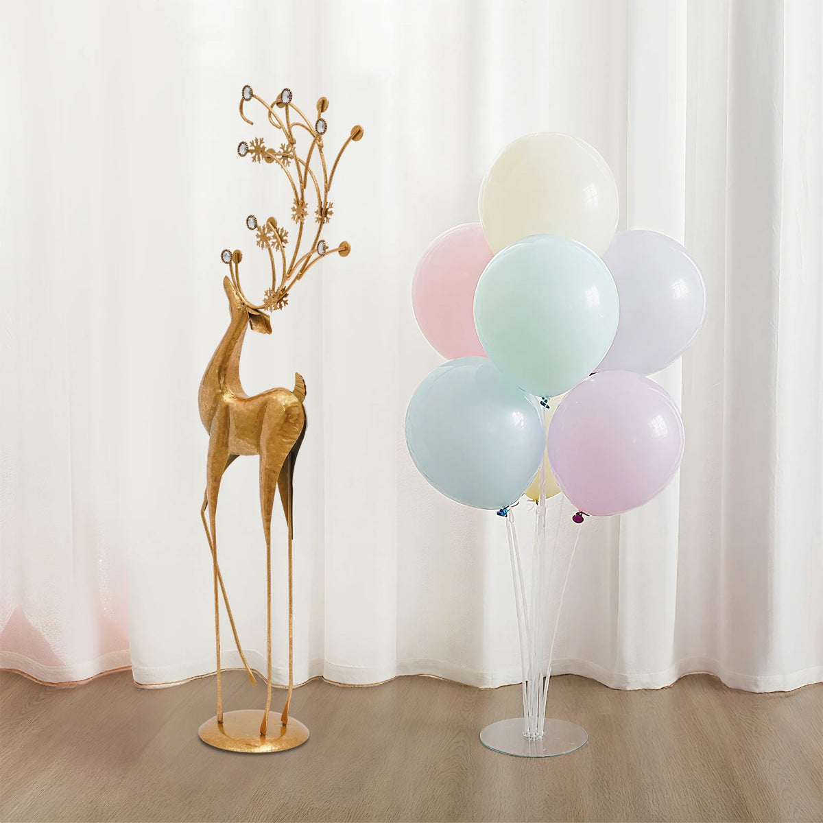 Gold metal deer sculpture with faux-crystal antlers (with balloons)