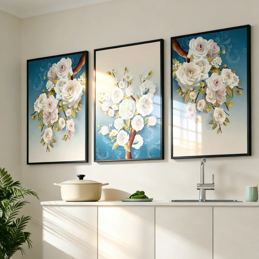 White blossom triptych on teal hung in a dining area