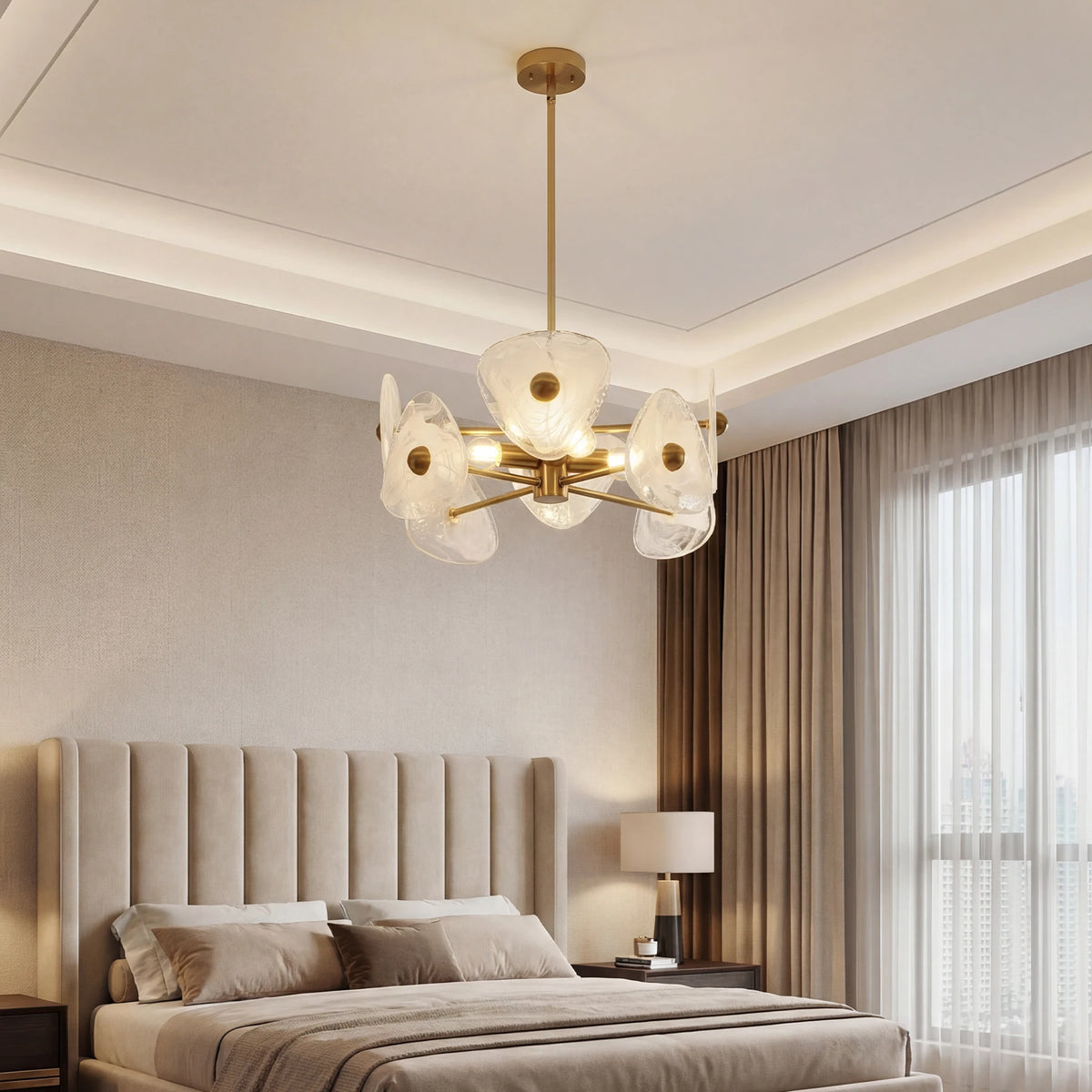 Gold chandelier with frosted petal shades in a bedroom