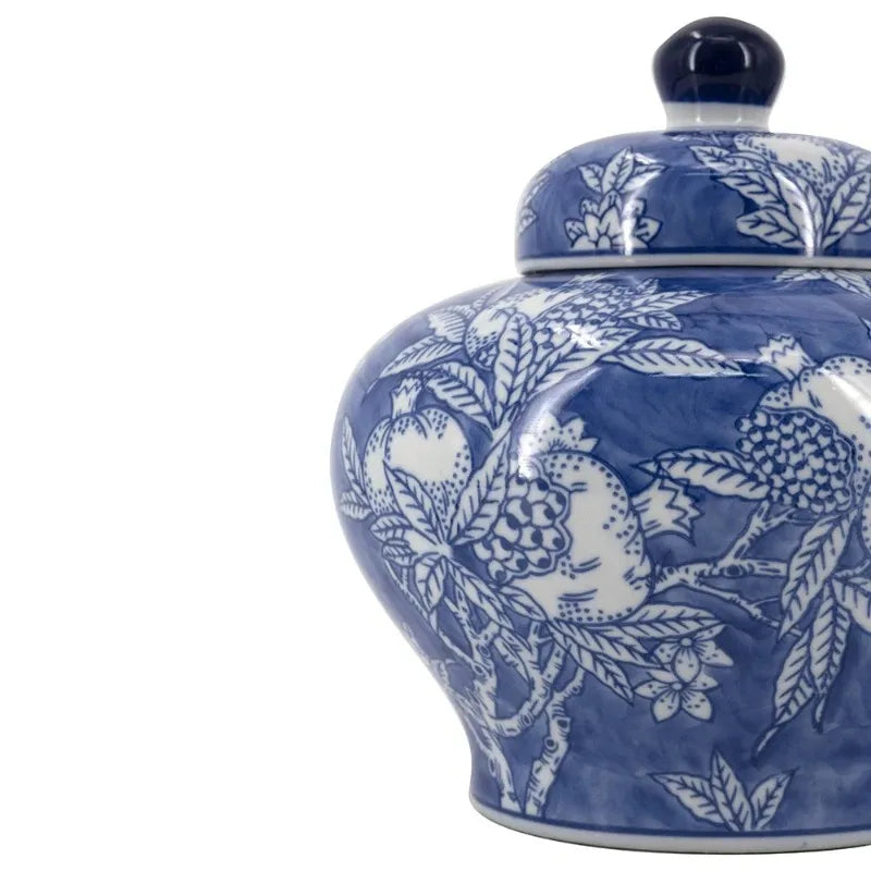 Close-up of the blue and white floral pattern on the porcelain jar