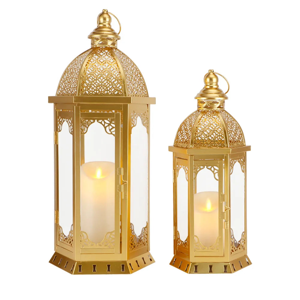 Set of two gold Moroccan candle lanterns with filigree domes and glass panels
