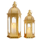 Set of two gold Moroccan candle lanterns with filigree domes and glass panels
