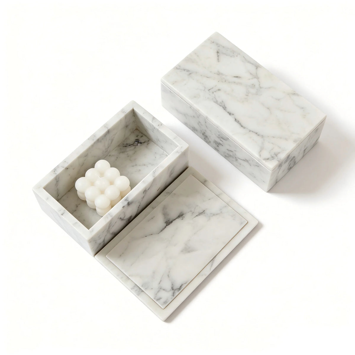 Open Carrara marble box with lid set aside