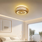 Woven bamboo ceiling light in a bright bedroom