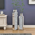 Mirrored crushed-crystal floor vases, set of two, in a living room