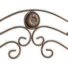 Scrollwork medallion detail on the bath shelf