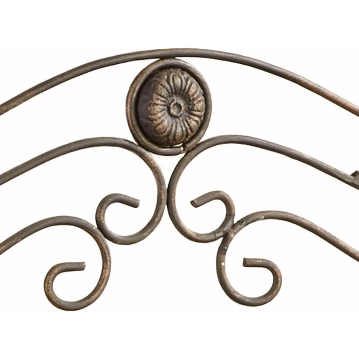 Scrollwork medallion detail on the bath shelf
