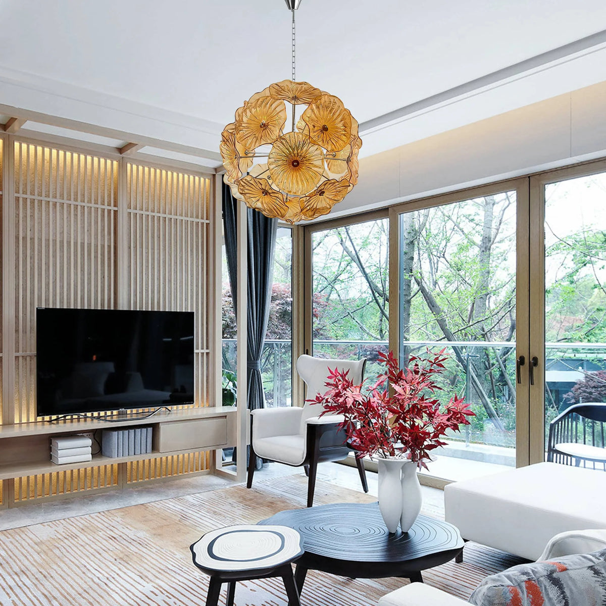 Amber glass flower chandelier in a living room with garden windows